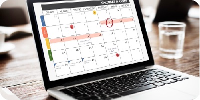 Laptop showing a planning calendar